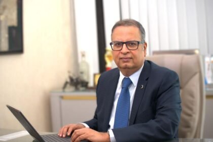 Sustainability advocate Sushil Reddy with his EV during the SunPedal Ride sponsored by RenewSys, covering 9,000+ km across India.