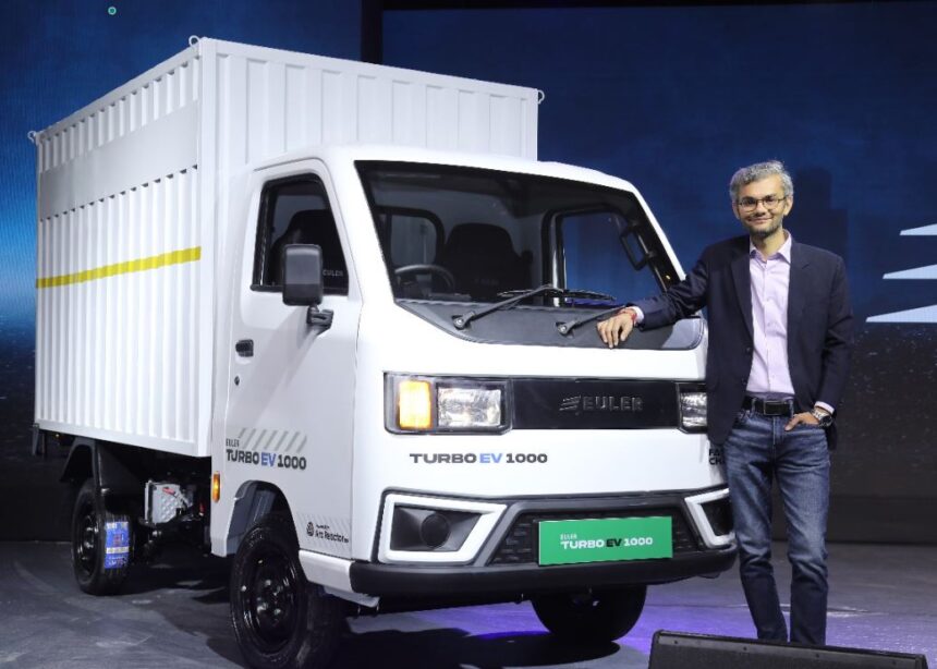 Euler Turbo EV 1000 electric mini truck parked on city road with charging setup