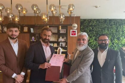 KP Group and Fabtech Group executives signing MoU for global green energy life sciences collaboration.