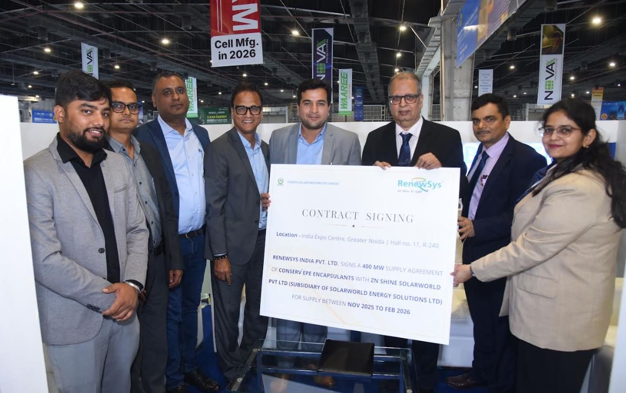 RenewSys and ZNShine Solarworld representatives signing a long-term solar encapsulant supply agreement.