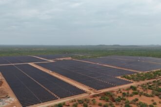 Aerial view of Scatec’s Mmadinare Solar Cluster in Botswana, featuring large solar panel arrays generating clean energy.