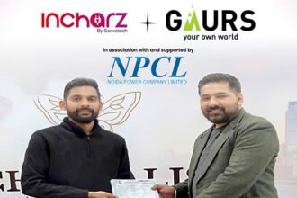 Incharz and Gaurs Group representatives announcing a new collaboration to install EV charging infrastructure across residential and commercial developments.