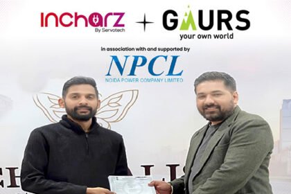 Incharz and Gaurs Group representatives announcing a new collaboration to install EV charging infrastructure across residential and commercial developments.