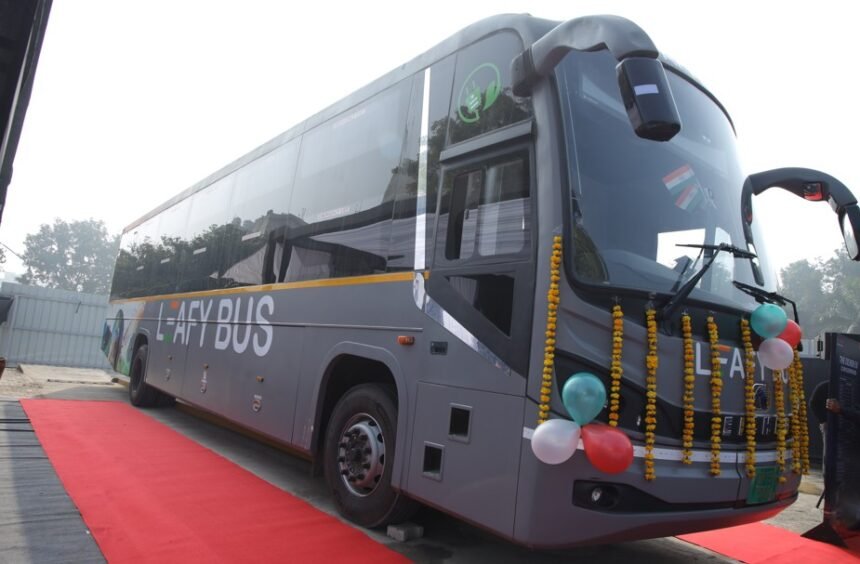Electric intercity sleeper bus from LeafyBus and Eicher on a national highway, representing long-distance clean mobility.