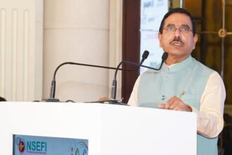 The Government of India is preparing to introduce PM-KUSUM 2.0, the next phase of the Pradhan Mantri Kisan Urja Suraksha evam Utthaan Mahabhiyan (PM‑KUSUM), with a proposed 10 GW agrivoltaic (Agri-PV) component aimed at accelerating renewable energy adoption in the agriculture sector. The announcement was made by Pralhad Joshi, Union Minister for New and Renewable Energy, during the 4th National Agro‑RE Summit held in New Delhi. The upcoming initiative is designed to enable farmers to generate solar power while continuing agricultural activities on the same land through agrivoltaic installations. The Agri-PV component under PM-KUSUM 2.0 is expected to facilitate large-scale solar deployment across agricultural land, allowing dual land use for both crop cultivation and renewable energy generation. This model can help farmers diversify income sources while contributing to the country’s clean energy transition. Launched in 2019, the PM-KUSUM scheme focuses on decentralised solar power generation for the agriculture sector, including solar pumps, feeder-level solarisation, and small grid-connected solar plants. The upcoming version is expected to further strengthen rural energy infrastructure while supporting India’s long-term renewable energy goals. Industry experts believe that PM-KUSUM 2.0 will play a key role in enhancing energy access in rural areas, lowering irrigation costs, and empowering farmers to participate directly in India’s renewable energy ecosystem.
